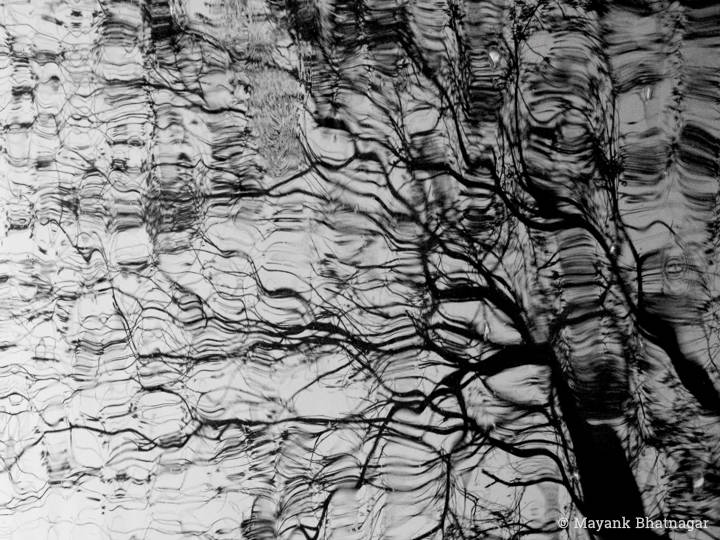 Black and white fine art photograph of water resembling a charcoal drawing